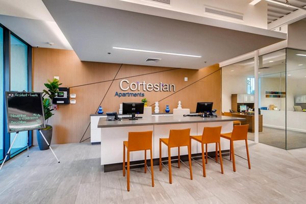 Clubhouse with modern design features at The Cortesian Apartments, a luxury Greystar property