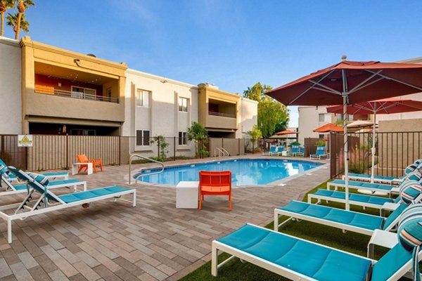 Resort-style swimming pool at The Cortesian Apartments, offering luxury relaxation in a vibrant community environment