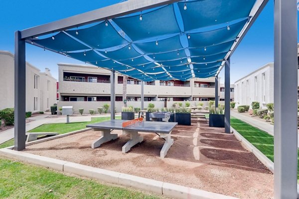The Cortesian: Lush courtyard with recreational spaces in luxury apartments, offering a tranquil retreat in Scottsdale