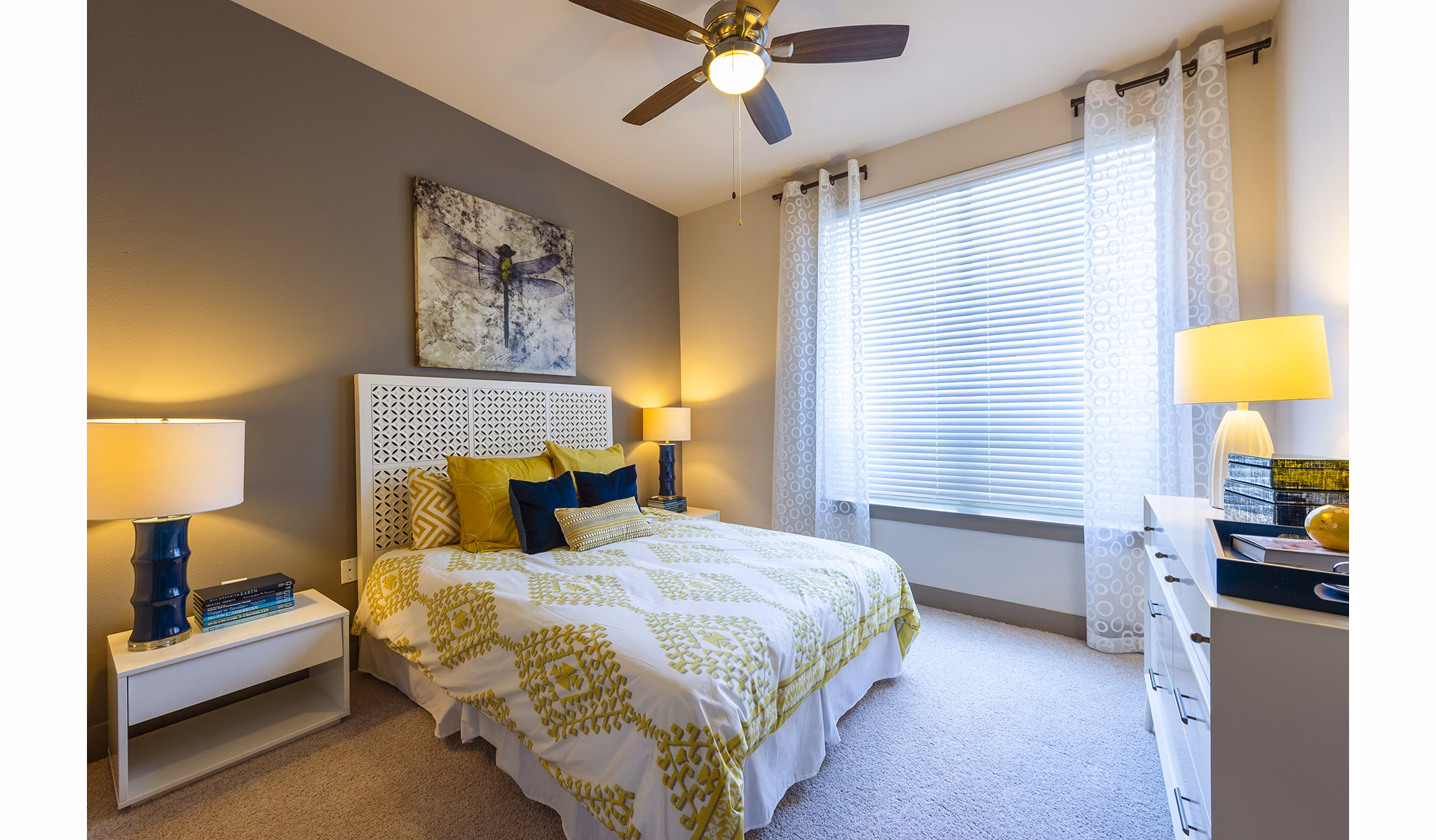 Elegant bedroom with modern furnishings at Virage Luxury Apartments, ideal for comfort and style in high-end living spaces
