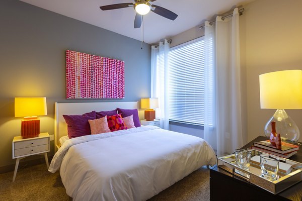 Modern bedroom with elegant decor in Virage Luxury Apartments