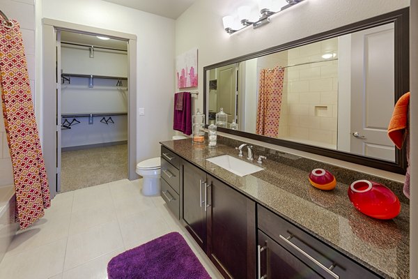 Bathroom in Virage Luxury Apartments featuring modern fixtures and sleek design