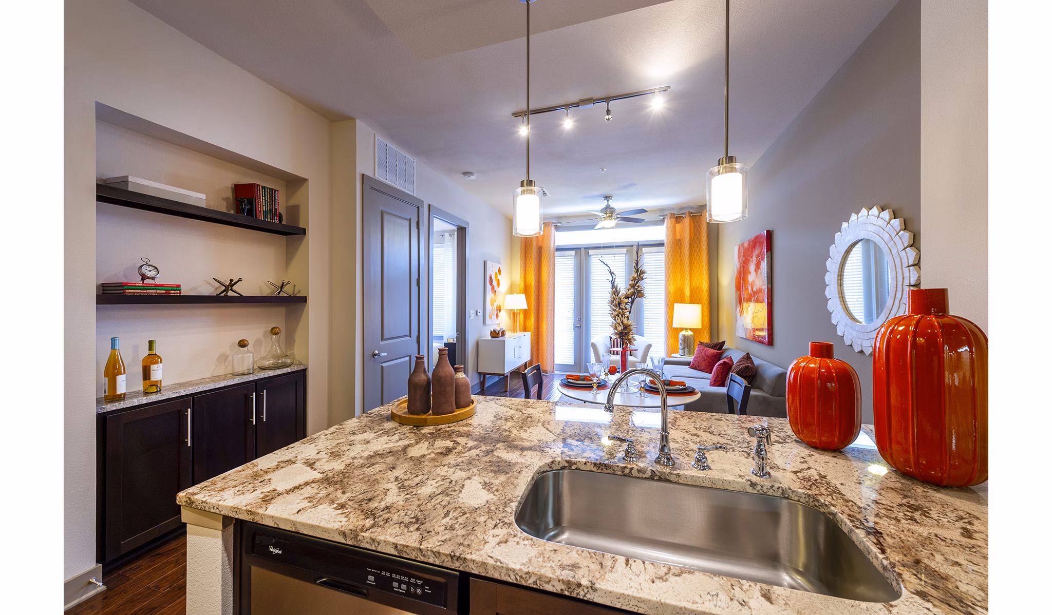 Spacious kitchen featuring sleek countertops and modern appliances in Virage Luxury Apartments