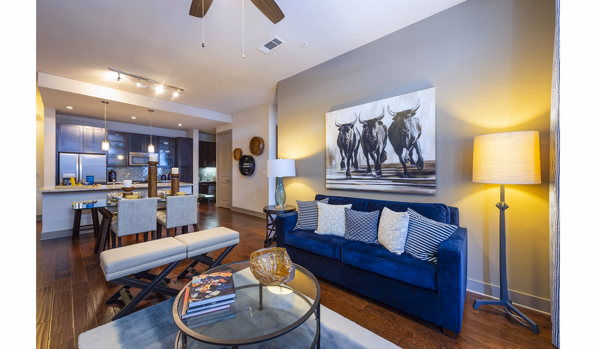 Contemporary living room with stylish decor and city views at Virage Luxury Apartments