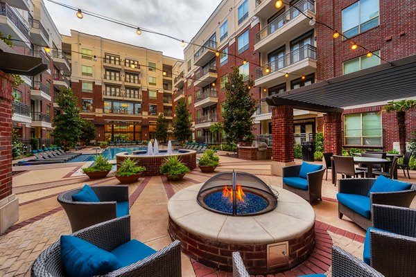 Skyline views from a modern rooftop deck at Virage Luxury Apartments