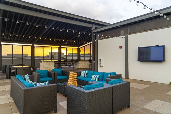 Outdoor terrace with stylish seating and greenery at Virage Luxury Apartments in San Francisco