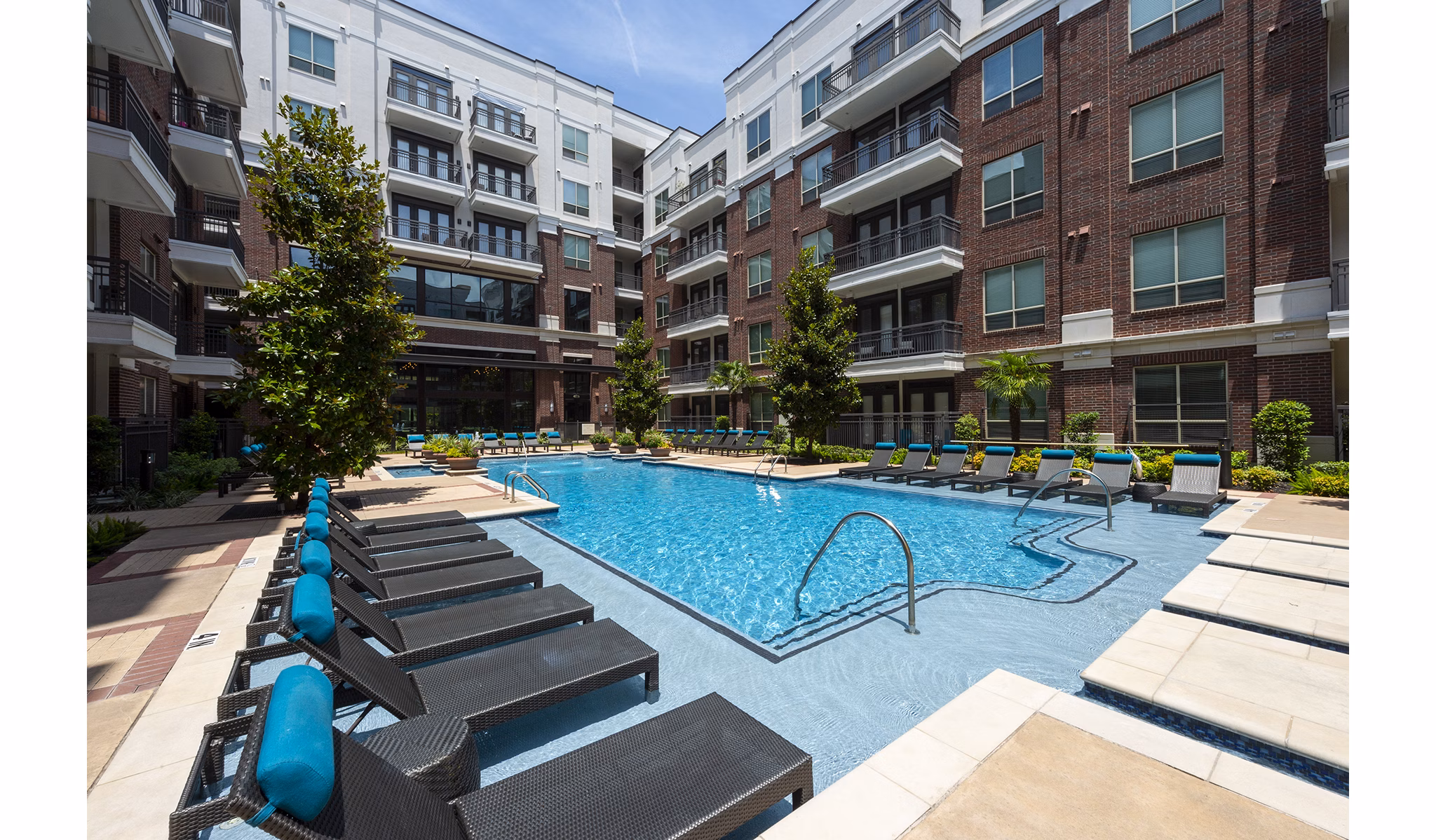 Cozy outdoor fire pit at Virage Luxury Apartments, ideal for evening gatherings and relaxation