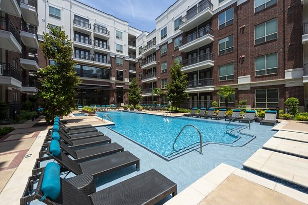 Cozy outdoor fire pit at Virage Luxury Apartments, ideal for evening gatherings and relaxation