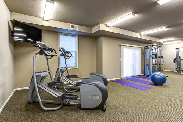 Fitness center with modern equipment at Fair Hills Apartments, a luxury community by Greystar