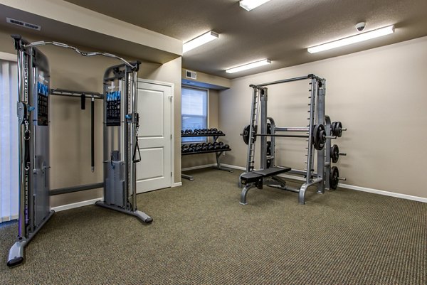 State-of-the-art fitness center at Fair Hills Apartments featuring modern gym equipment and spacious workout areas