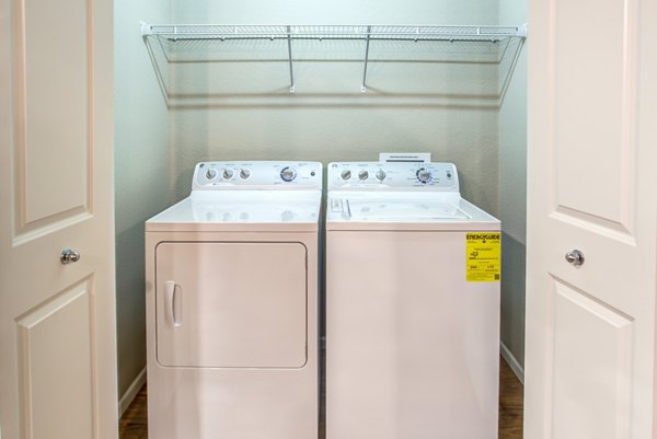 Laundry room with modern appliances at Fair Hills Apartments, by Greystar: Enjoy convenience in luxury living