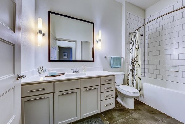 Bathroom featuring modern finishes at Agave Apartments