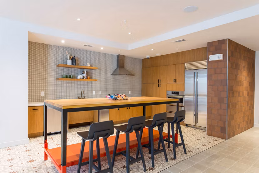 Luxurious clubhouse featuring modern design and ample seating at Agave Apartments
