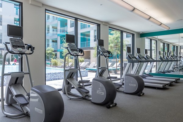 State-of-the-art fitness center with modern equipment at Agave Apartments