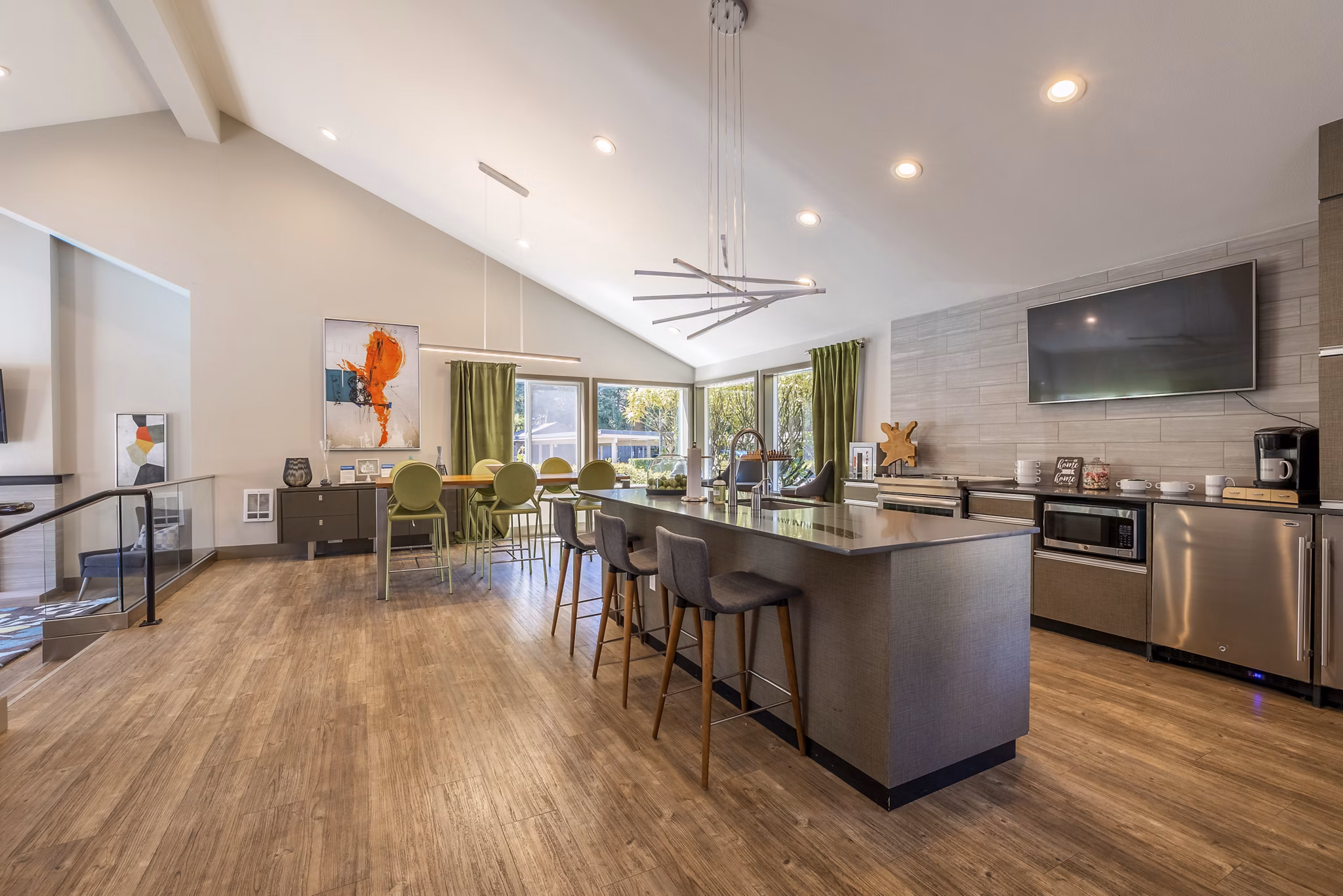 Luxurious clubhouse at The Seasons Apartments featuring modern decor and ample seating spaces for resident gatherings and events