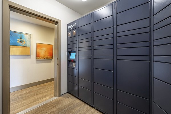 Clubhouse with modern furnishings and open spaces at The Seasons Apartments