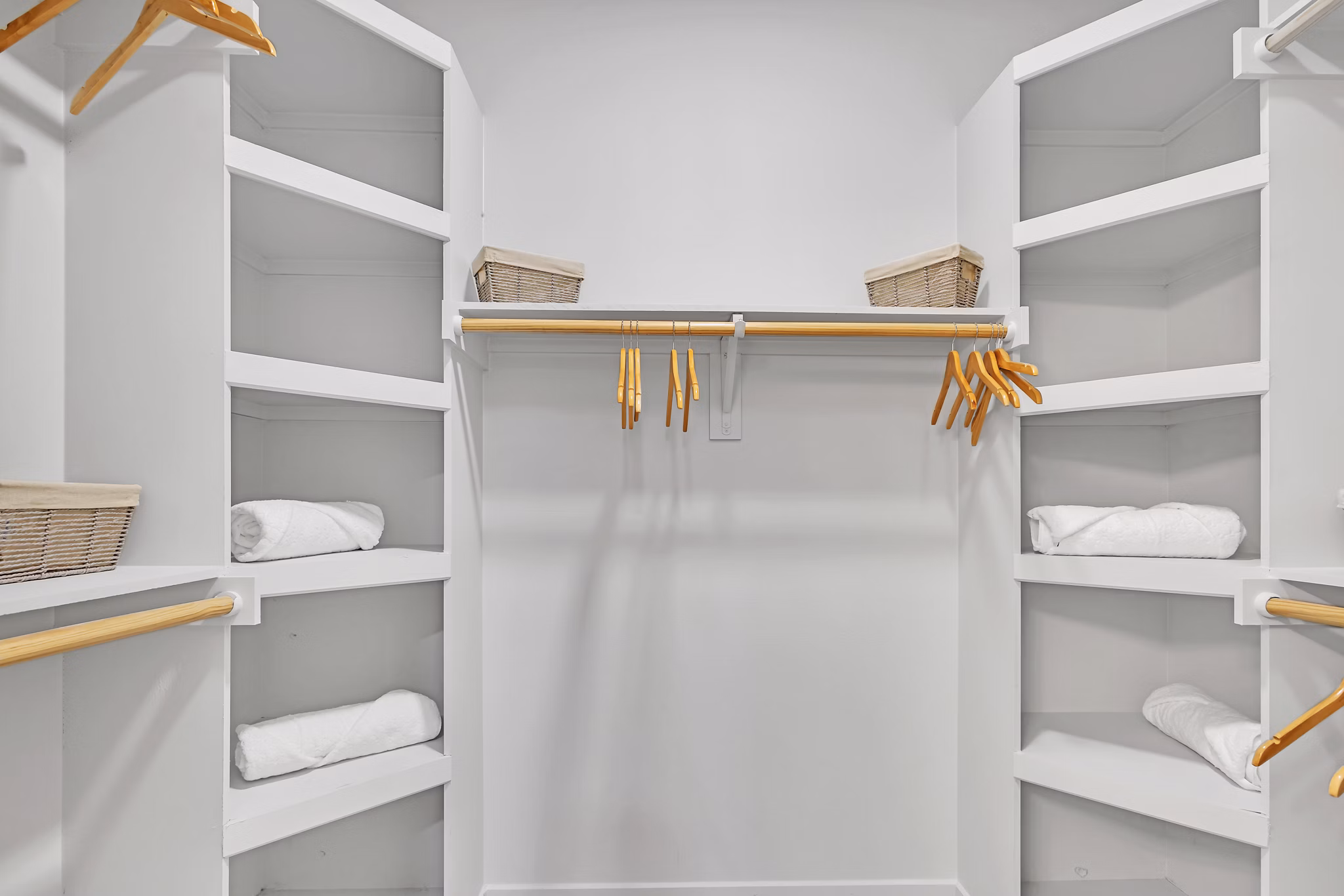 Spacious closet with ample storage in Oak & Ellum Apartments luxury unit