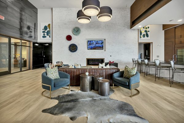 Clubhouse featuring modern design and social spaces at Oak & Ellum Apartments in Dallas