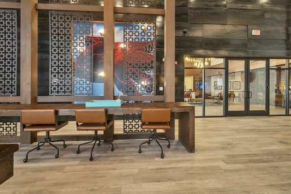 Elegant clubhouse with modern seating areas at Oak & Ellum Apartments