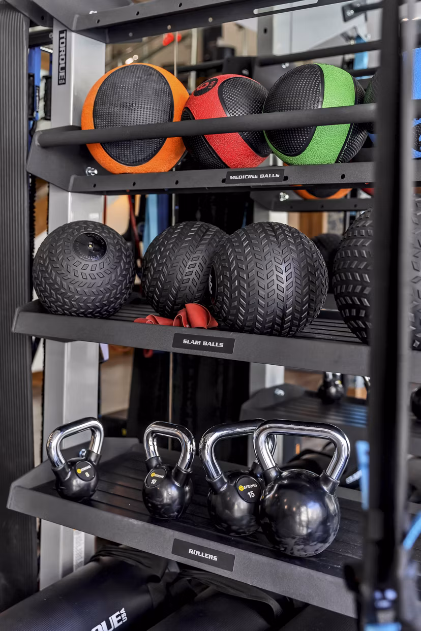 State-of-the-art fitness center with cardio and strength equipment at Oak & Ellum Apartments luxury community