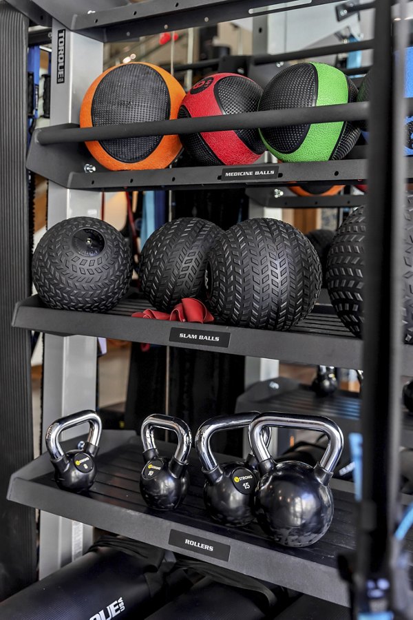 State-of-the-art fitness center with cardio and strength equipment at Oak & Ellum Apartments luxury community