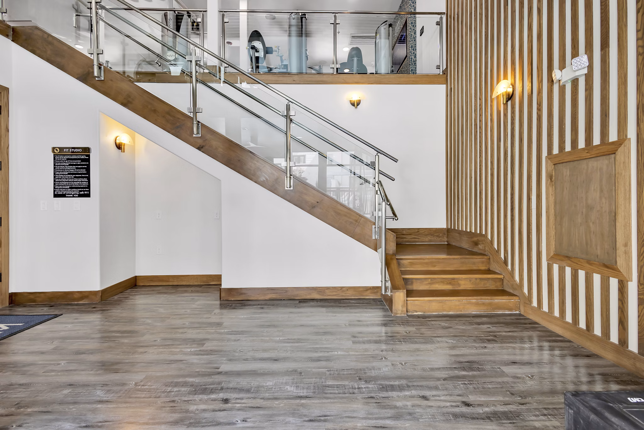 Modern fitness center with state-of-the-art equipment at Oak & Ellum Apartments