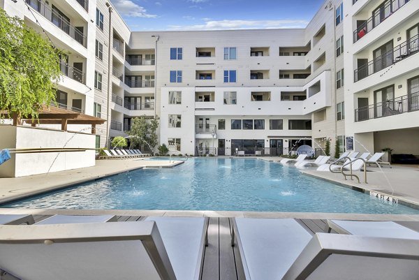 Rooftop pool with city views at Oak & Ellum luxury apartments