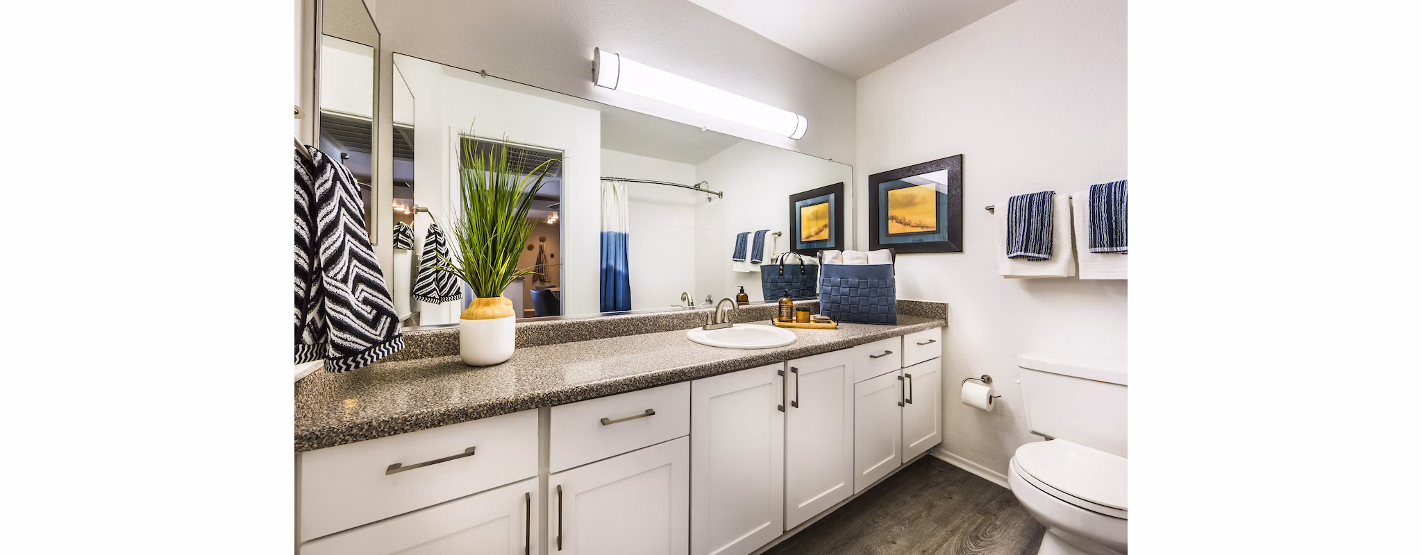 Modern bathroom with sleek fixtures and granite countertops at Avana Rancho Cucamonga Apartments