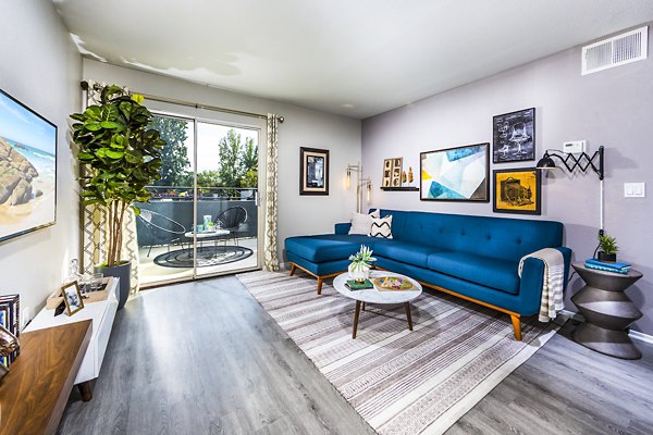 Bright living room with modern decor in Avana Rancho Cucamonga Apartments