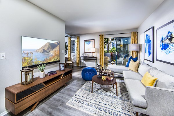Spacious living room with modern decor at Avana Rancho Cucamonga Apartments