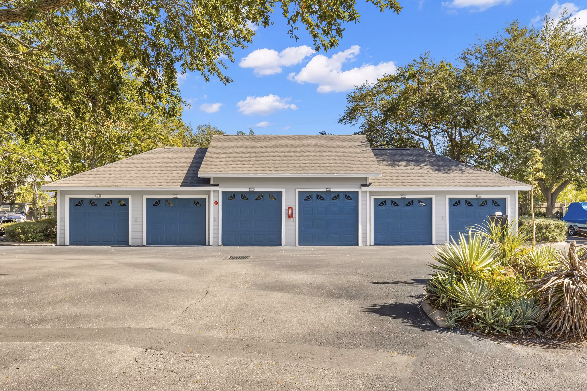 Covered garage parking at Avana City Park Apartments, providing secure and convenient options for residents' vehicles