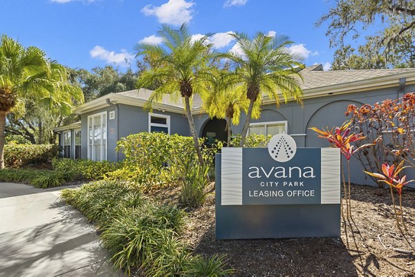 Clubhouse featuring modern decor and seating area at Avana City Park Apartments