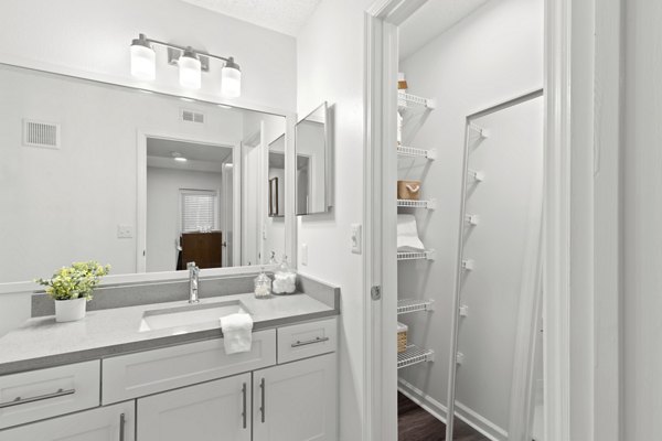 Modern bathroom with sleek fixtures at Avana City Park Apartments