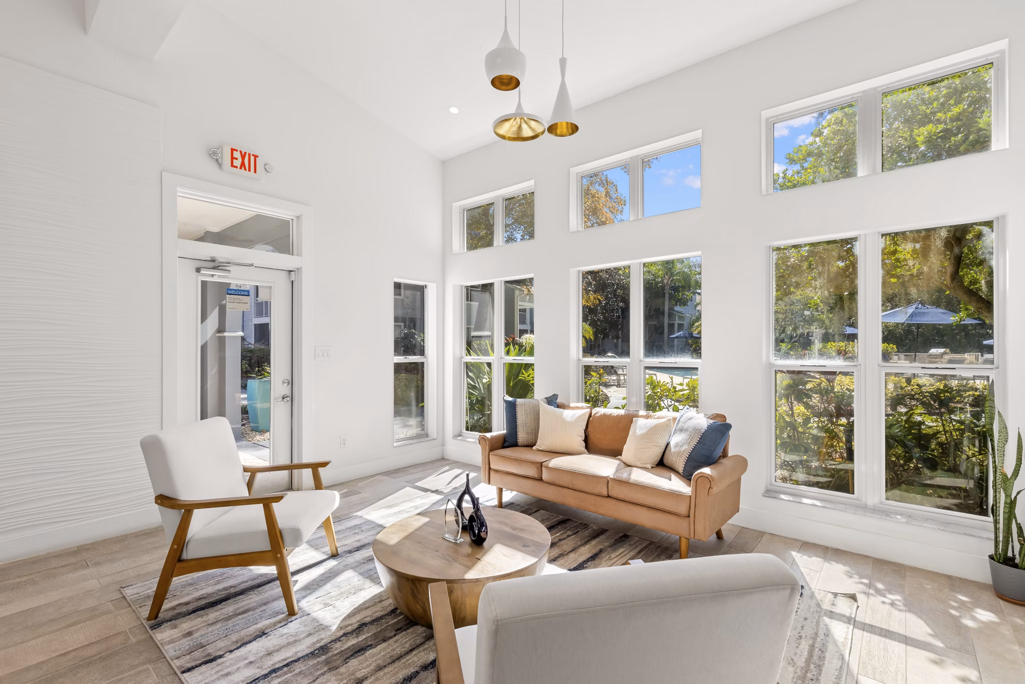 Clubhouse with modern furnishings at Avana City Park Apartments featuring luxury amenities