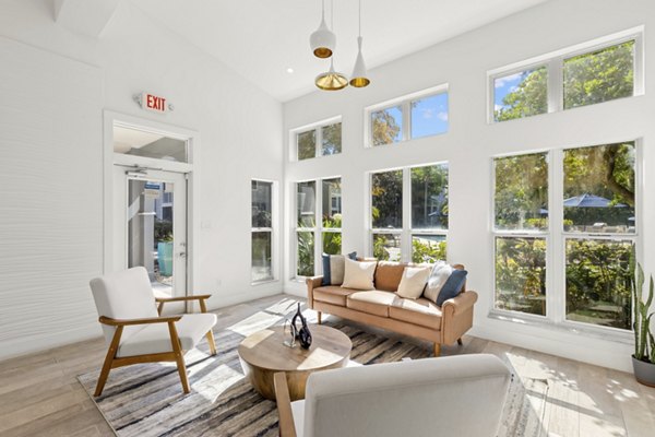 Clubhouse with modern furnishings at Avana City Park Apartments featuring luxury amenities