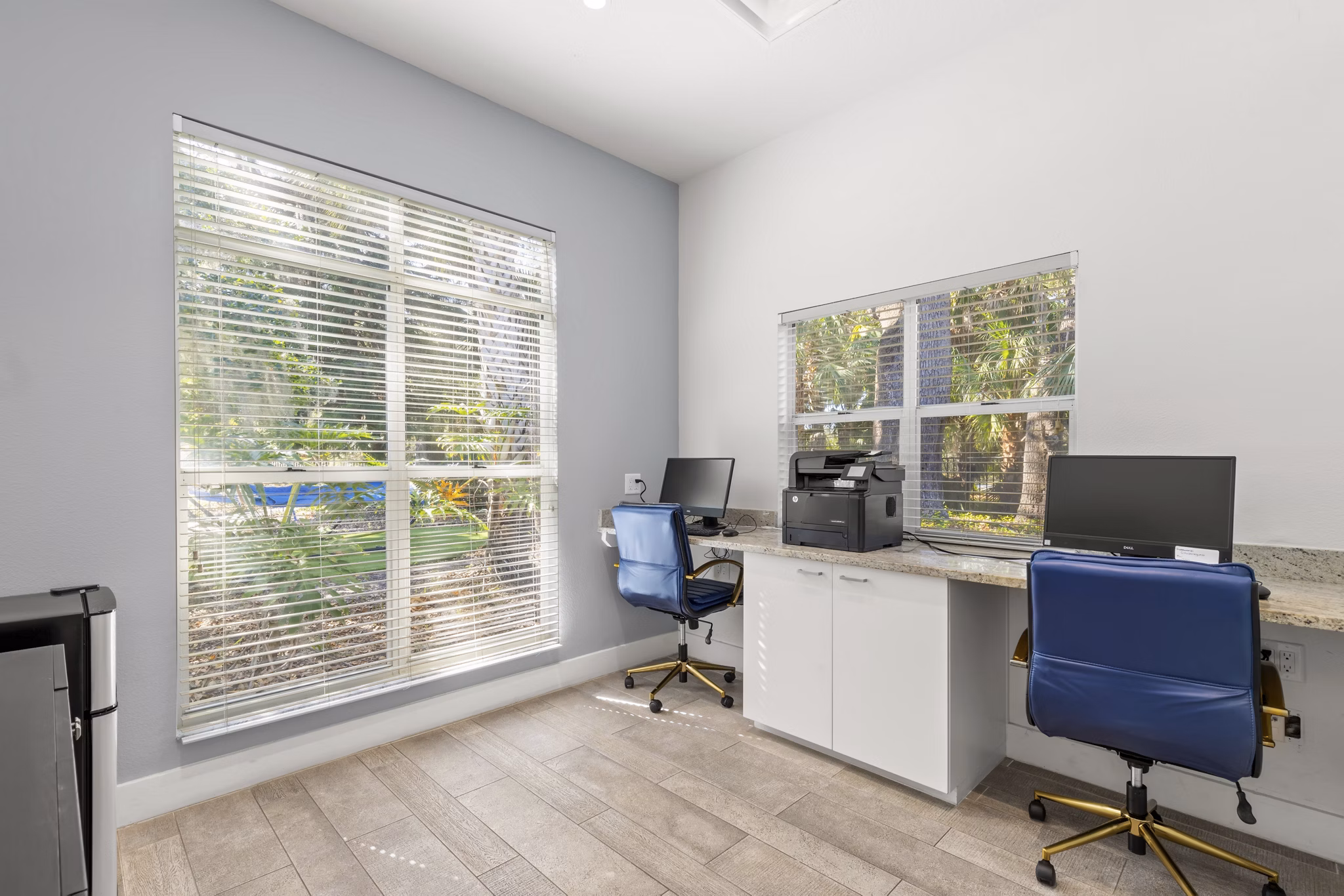 Modern business center at Avana City Park Apartments with collaborative workspaces