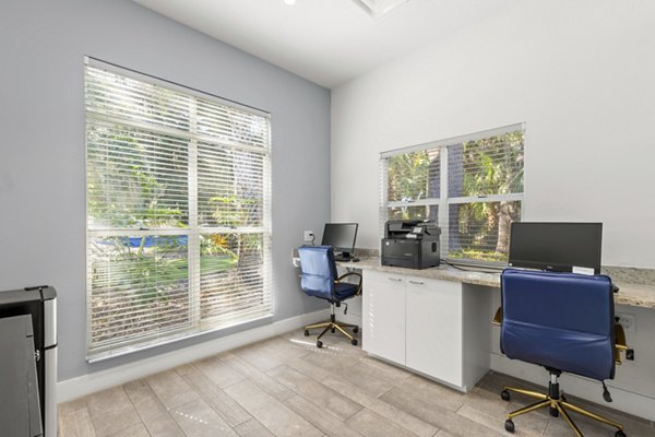 Modern business center at Avana City Park Apartments with collaborative workspaces
