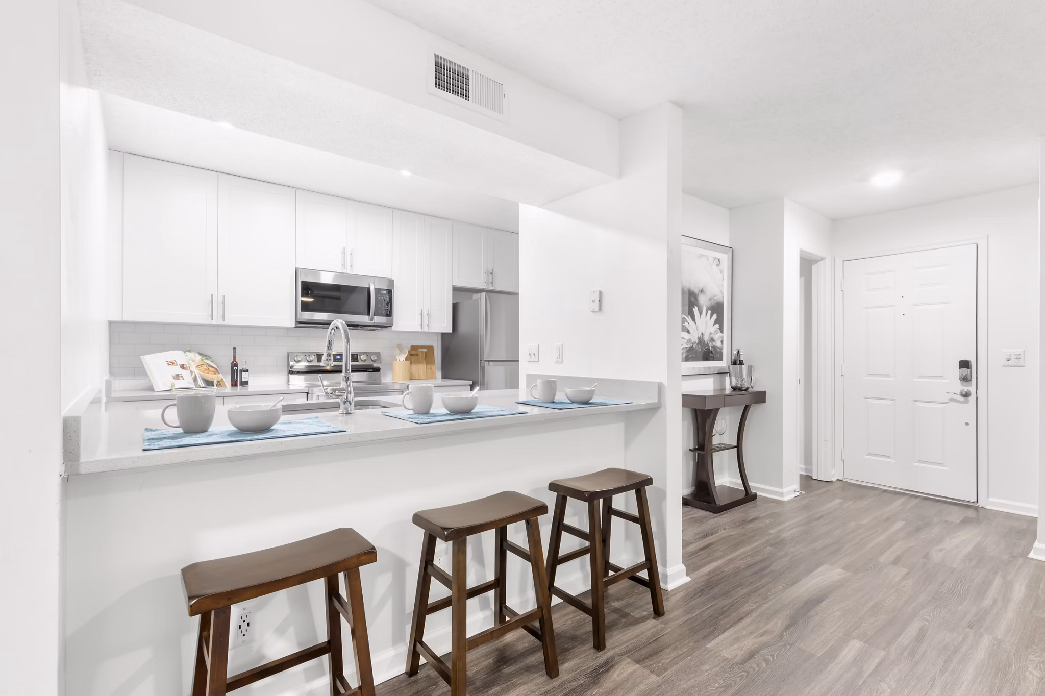 Spacious kitchen with modern appliances at Avana City Park Apartments in Houston