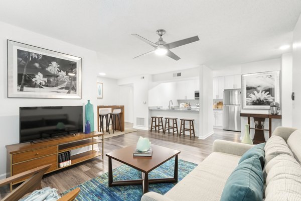 Spacious living room with modern decor at Avana City Park Apartments