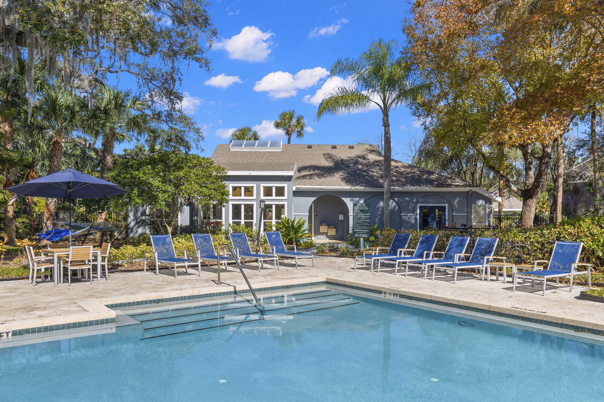Resort-style pool with cabanas at Avana City Park Apartments, luxury living by Greystar in an urban oasis setting