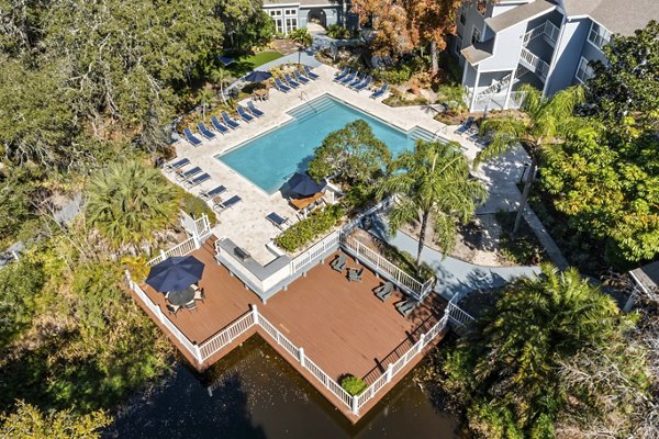 Inviting pool area at Avana City Park Apartments offering luxury relaxation and leisure options for residents in a vibrant community setting