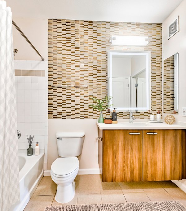 Bathroom with modern fixtures and sleek design at The Stories Apartments in New York City Luxurious living in Greystar's premium residential space