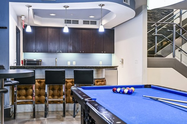 The Stories Apartments: Spacious clubhouse featuring modern furnishings and social spaces