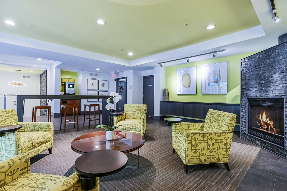 Elegant clubhouse with co-working spaces at The Stories Apartments