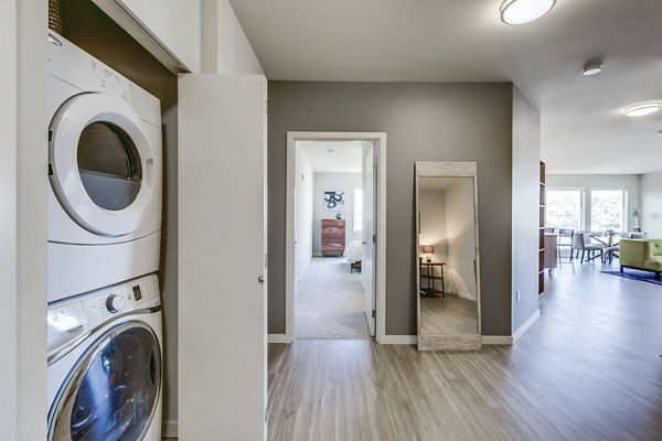living room/laundry at Stackhouse Apartments