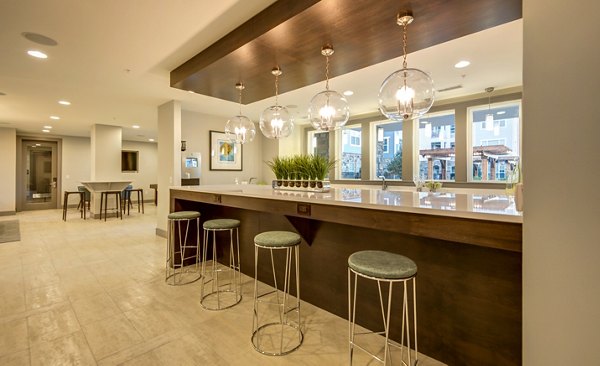 Clubhouse featuring modern design and social spaces at Element Ballantyne Apartments