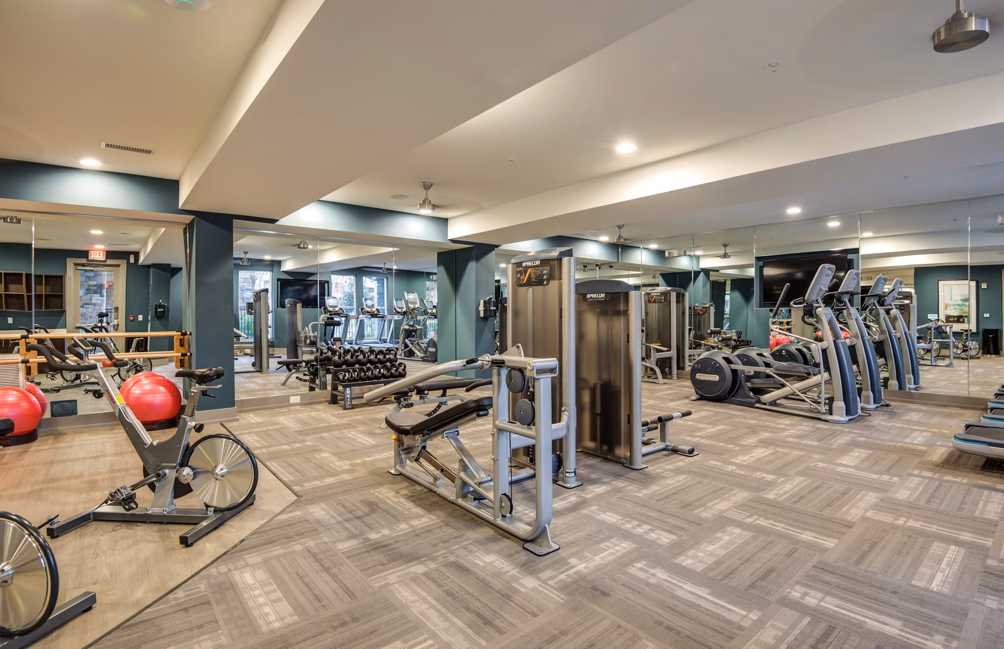 Fitness center with modern equipment at Element Ballantyne Apartments in Charlotte, NC