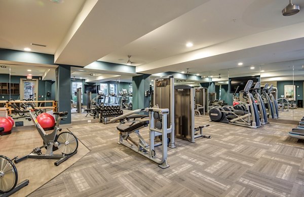 Fitness center with modern equipment at Element Ballantyne Apartments in Charlotte, NC