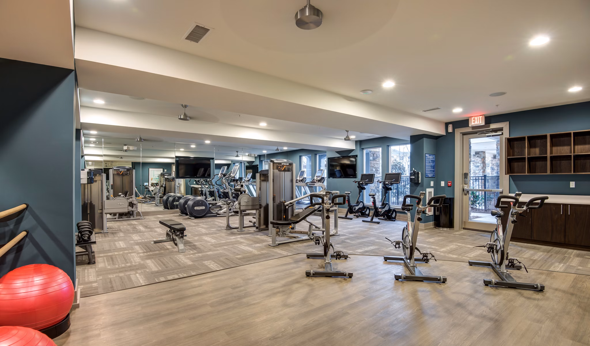 Modern fitness center with state-of-the-art equipment at Element Ballantyne Apartments