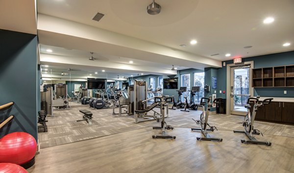 Modern fitness center with state-of-the-art equipment at Element Ballantyne Apartments